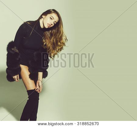Young Pretty Woman Or Cute Sexy Girl With Long Beautiful Curly Blonde Hair And Adorable Face In Blac