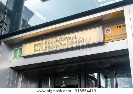 Brussels, Belgium - June 5, 2019: Sign Brussel-west Bruxelles-ouest On Railway Station.