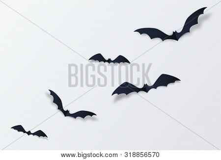 Halloween Bat Vector Decor Background. Paper Cut Style. Black Vampire Flittermouse Flying Over White