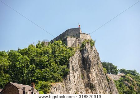 Dinant, Belgium - June 26, 2019: Closeup Of Fish Eye View Of Citadelle Front Top With Belgian Flag U