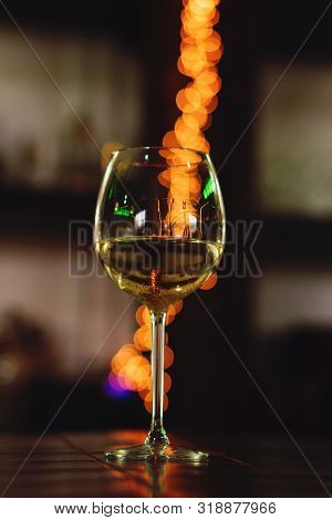 Glass With White Wine, Tasting, Restaurant.  Concept Alcoholic Drinks.