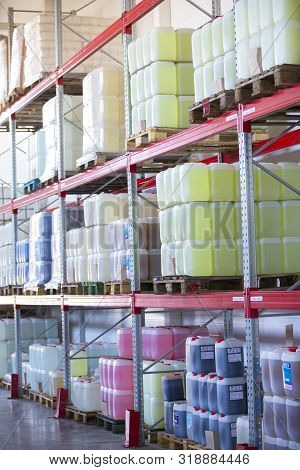 Belarus, The City Of Mensk, April 12, 2019. Chemical Production.warehouse With Shelves, Plastic Cans