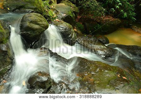 Water Flowing Over Rocks At Khao Ito Waterfall,prachin Buri City,thailand.
