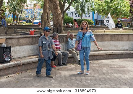 Couple Dancing In The Miguel De Cervantes Saavedra Park In David Panama
