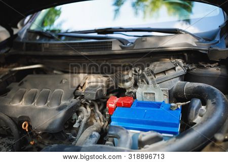 new lead-acid automotive electric battery replacement in old car