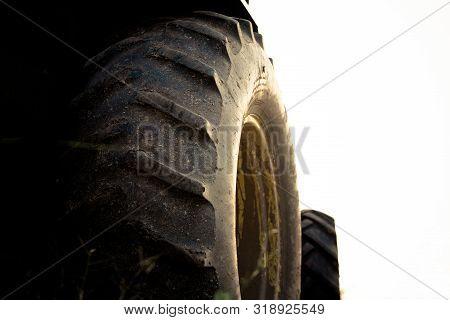 Tractor Wheel Isolated On White Background,tractor Tire On Field,old Tractor Wheel
