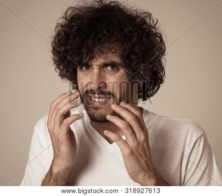 Portrait Of Young Man Feeling Disgusted And Shocked At Some Violent Scene Or Smelling Or Disgusting 