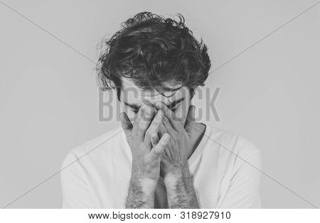 Close Up Portrait Of Young Sensitive Man Feeling In Love Looking Happy, Shy And Lucky. Isolated On N