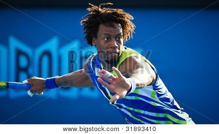 MELBOURNE - 21 januar: Gael Monfils fra Frankrig i sin tredje runde tab til Mikhail Kukishkin af Kazak