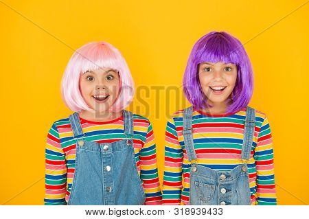 Anime Convention. Happy Little Girls. Anime Fan. Cheerful Friends In Colorful Wigs. Anime Cosplay Pa