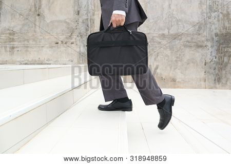 Business Man Step Up Stair.lower Part Of Man In Business Shoes Walking Up Stair,people Lifestyle Suc