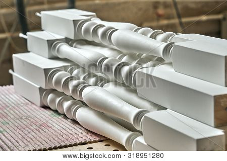 Balusters Process Production. Solid Wood Balusters Before Finishing. Furniture Manufacture. Close-up