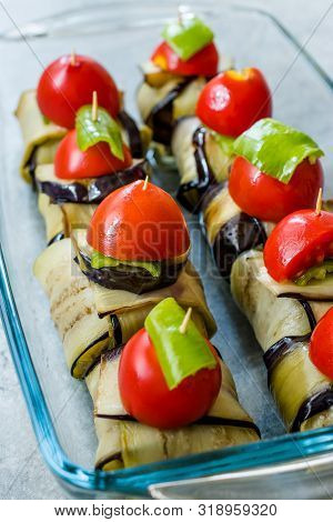 Turkish Islim Kofta Kebab With Meatballs And Cherry Tomatoes Wrapped In Eggplant / Aubergine Slices.