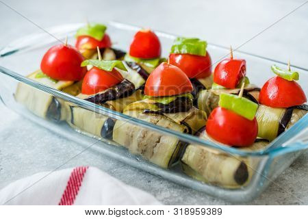Turkish Islim Kofta Kebab With Meatballs And Cherry Tomatoes Wrapped In Eggplant / Aubergine Slices.