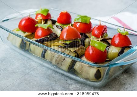 Turkish Islim Kofta Kebab With Meatballs And Cherry Tomatoes Wrapped In Eggplant / Aubergine Slices.