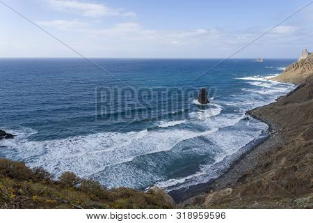 Black Sand Beach In Spain On The Island Of Tenerife.