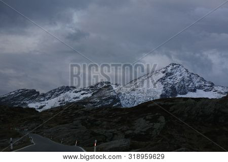 Snowcapped Mountains Seen From A Mountain Road In Switzerland, Europe