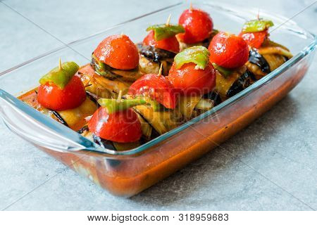 Turkish Islim Kofta Kebab With Meatballs And Cherry Tomatoes Wrapped In Eggplant / Aubergine Slices.