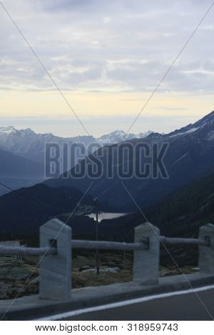 Snowcapped Mountains Seen From A Mountain Road In Switzerland, Europe