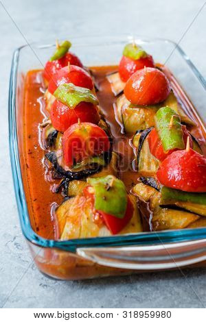 Turkish Islim Kofta Kebab With Meatballs And Cherry Tomatoes Wrapped In Eggplant / Aubergine Slices.
