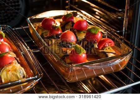 Turkish Islim Kofta Kebab With Meatballs And Cherry Tomatoes Wrapped In Eggplant / Aubergine Slices