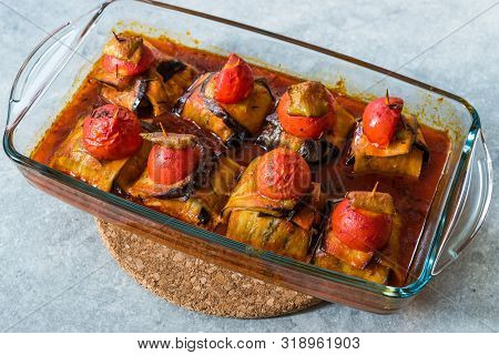 Turkish Islim Kofta Kebab With Meatballs And Cherry Tomatoes Wrapped In Eggplant / Aubergine Slices.