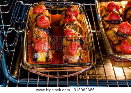 Turkish Islim Kofta Kebab With Meatballs And Cherry Tomatoes Wrapped In Eggplant / Aubergine Slices