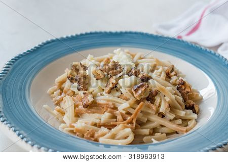 Turkish Homemade Food Noodle / Eriste With Cheese And Walnuts.