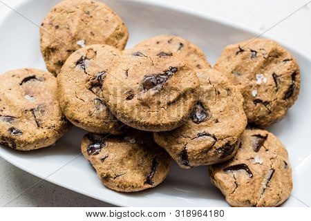 Paleo Chocolate Chip Cookies Made With Coconut And Almond Flour On Baking Sheet / Paper.