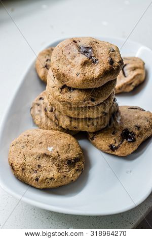Paleo Chocolate Chip Cookies Made With Coconut And Almond Flour On Baking Sheet / Paper.
