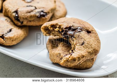 Paleo Chocolate Chip Cookies Made With Coconut And Almond Flour On Baking Sheet / Paper.