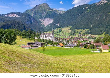 Scenic View Of A Traditional Medieval Alpine Village On A Sunny Day. Lungern Switzerland.
