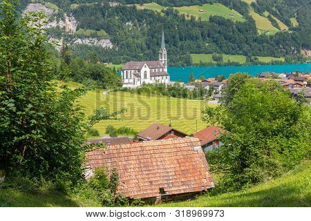 Scenic View Of A Traditional Medieval Alpine Village On A Sunny Day. Lungern Switzerland.