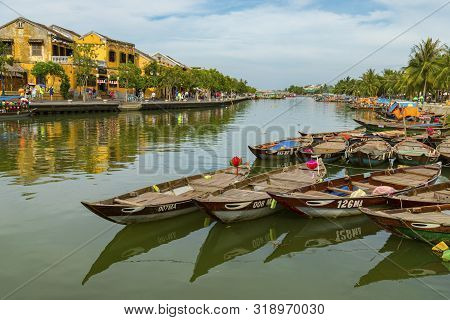 Hoi An , Vietnam - June 25 , 2019 : View Of Boats On Busy River In Hoi An, Vietnam. Hoi An Is The Wo