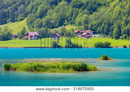 Scenic View Of A Traditional Medieval Alpine Village On A Sunny Day. Lungern Switzerland.
