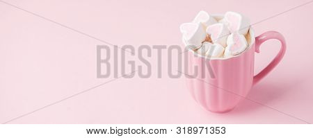 Pink Light Pastel Background. Cup Of Dark Coffee, Hearts Shaped Marshmallow. Valentine's Wedding Day