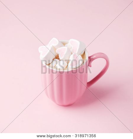 Pink Light Pastel Background. Cup Of Dark Coffee, Hearts Shaped Marshmallow. Valentine's Wedding Day