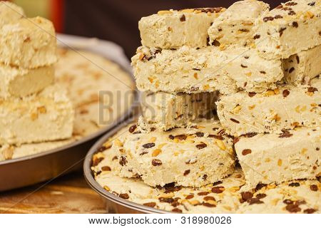 Halvah Sweet Traditional Food Dessert Made Of Nuts. Delicious Food, Tasty Healthy Snacks Concept.