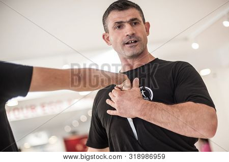 Kapap Instructor Altin Qoku, Demonstrates Disarm Techniques Against Knife Attack