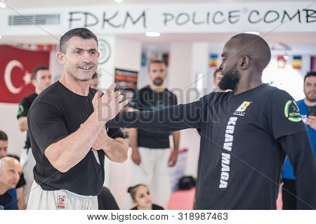Kapap Instructor Altin Qoku, Demonstrates Disarm Techniques Against Knife Attack