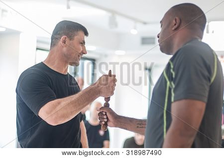 Kapap Instructor Altin Qoku, Demonstrates Disarm Techniques Against Knife Attack