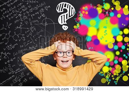 Kid With Question Marks On Background With Science And Arts Scetch