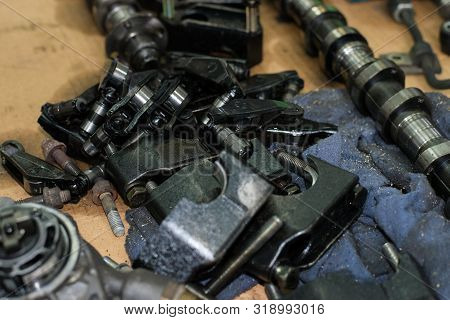 Camshaft, Bolts, Nuts, Rocker Arm Tappet Valve Taken From A Broken Car Top View