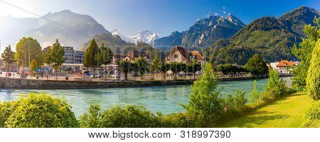 Panoramic View Of Old City With Thrain Station And Aare River. Interlaken, Important Tourist Center 