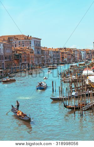 Venice, Italy - May 25, 2019: Gondolas At Grand Canal In Italy Summer Time