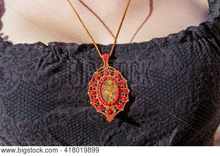 Pendant From Macrame With A Semi-precious Stone Bronzite