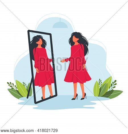 Woman Trying On A Beautiful Red Dress In The Store In Front Of The Mirror. Try On Fashion Clothes Co