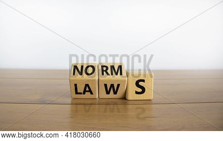Laws Or Norms Symbol. Turned Cubes And Changed The Word 'norms' To 'laws'. Beautiful Wooden Table, W