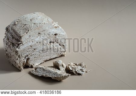 Peanut Halva On A Light Brown Background Top View-side Space For Text. Halva Oriental Sweets