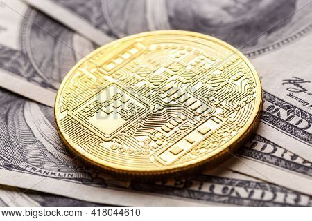 Golden Bitcoin Lies On The Banknotes.new Virtual Money. Crypto Currency Top View. Real Coins Of Bitc